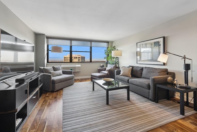 living room with dark hardwood / wood-style flooring