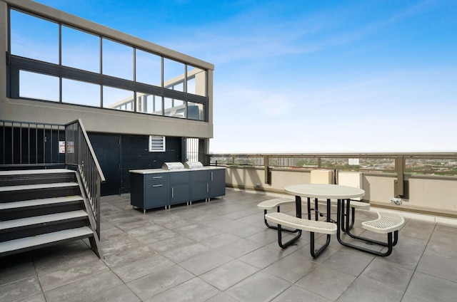 view of patio / terrace featuring a balcony