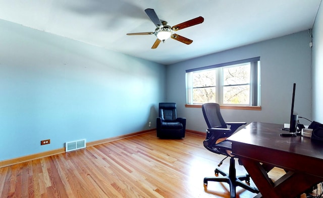 office area with ceiling fan and light wood-type flooring