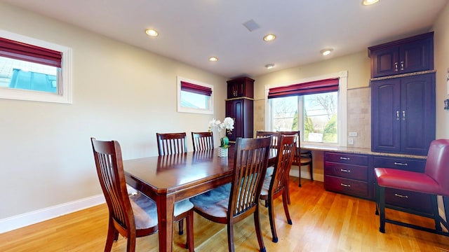 dining space featuring light hardwood / wood-style flooring