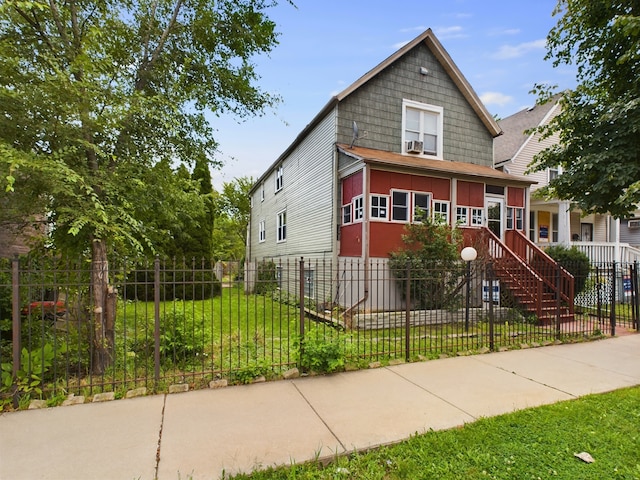 view of front facade with a front lawn