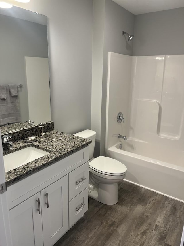 1107 S 2nd St, Oregon, IL 61061 - full bathroom with vanity, wood-type flooring, toilet, and shower / bath combination