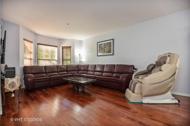 living room featuring dark wood-type flooring