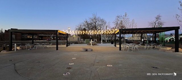 view of home's community with a patio area