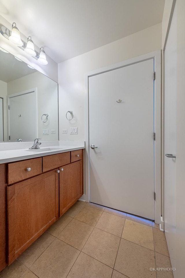 bathroom featuring vanity and tile patterned flooring