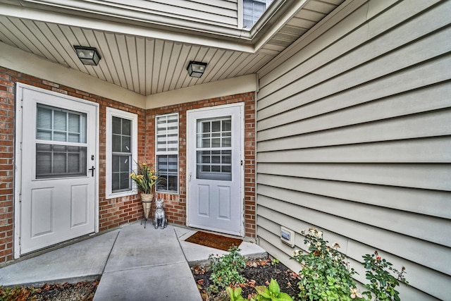 property entrance with a patio area