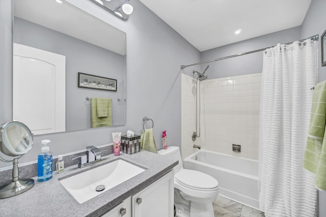 full bathroom featuring shower / bath combination with curtain, vanity, and toilet