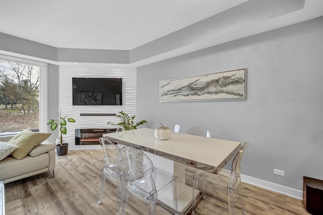 dining area featuring hardwood / wood-style flooring