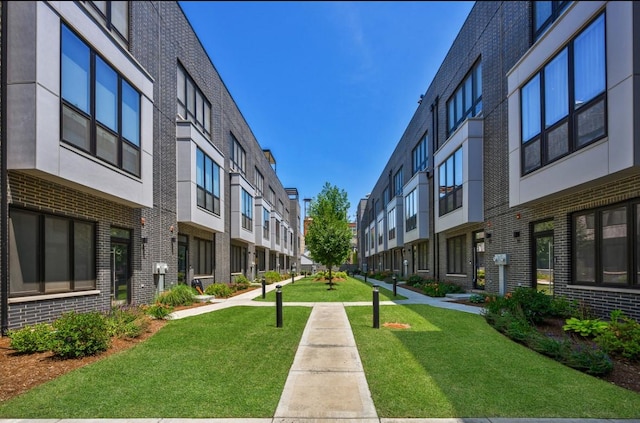 view of community featuring a lawn