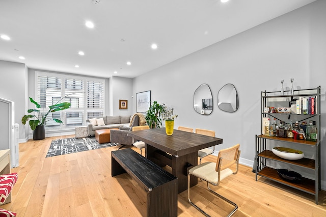 dining room with light hardwood / wood-style floors