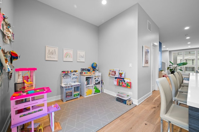 playroom featuring light hardwood / wood-style floors