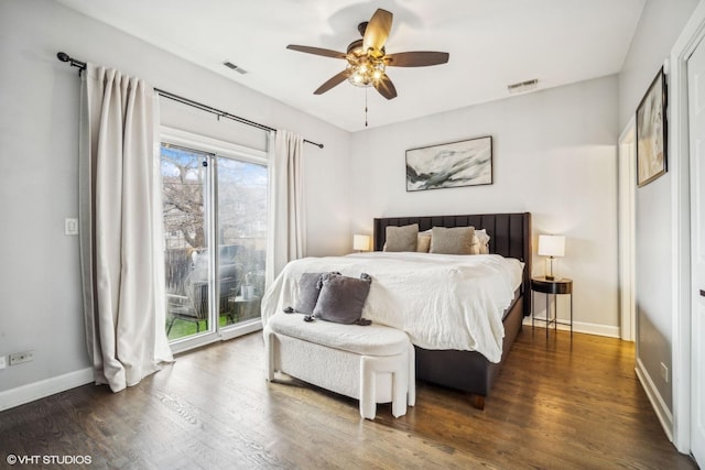 bedroom featuring ceiling fan, dark hardwood / wood-style floors, and access to outside