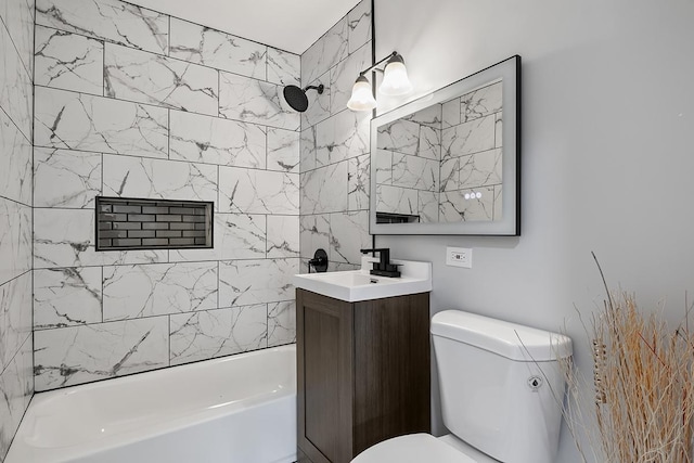 full bathroom with tiled shower / bath combo, vanity, and toilet