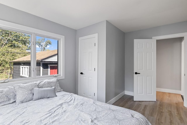 bedroom featuring hardwood / wood-style flooring