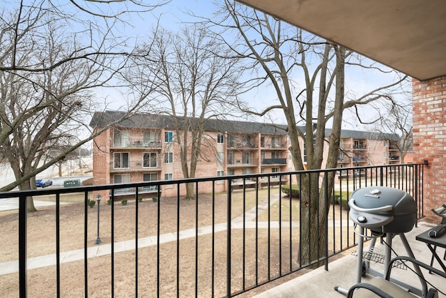 balcony featuring area for grilling