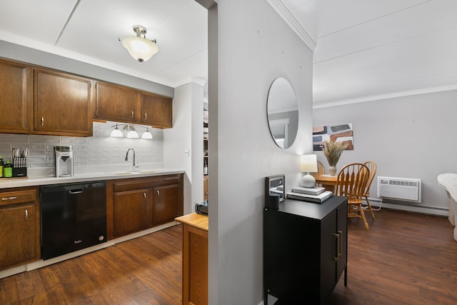 kitchen with sink, tasteful backsplash, crown molding, a wall mounted air conditioner, and black dishwasher