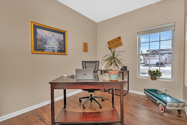 office space with hardwood / wood-style floors