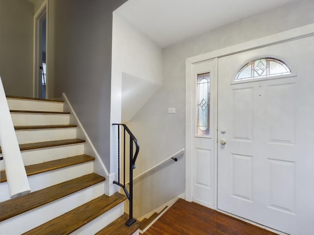 entrance foyer featuring dark hardwood / wood-style floors