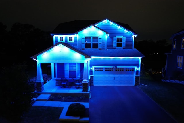 view of front of property featuring a garage