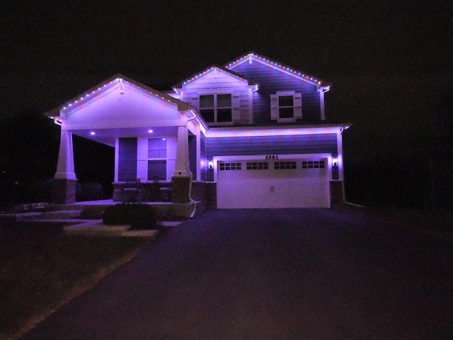 view of front of home with a garage