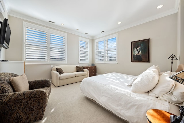 bedroom featuring ornamental molding and carpet floors