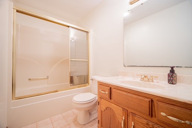 full bathroom featuring vanity, tile patterned floors, shower / bath combination with glass door, and toilet