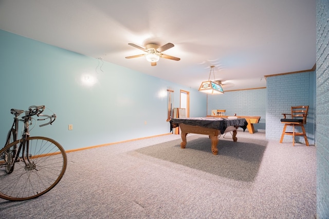 playroom with ceiling fan, billiards, brick wall, and carpet floors