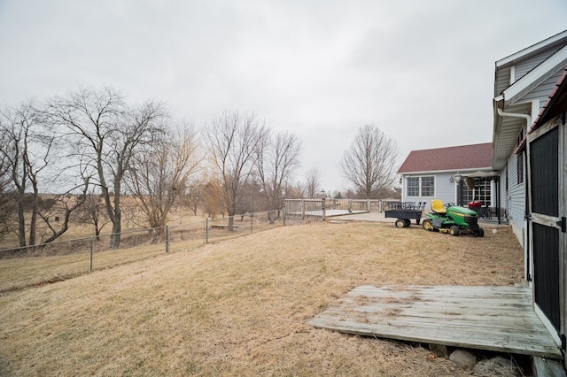 view of yard with a wooden deck