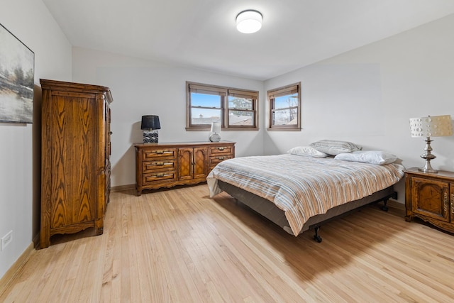 bedroom featuring light hardwood / wood-style flooring