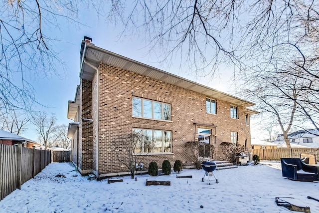 view of snow covered property