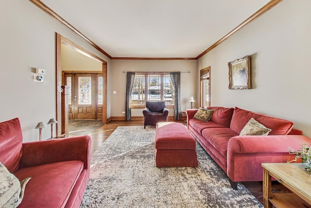 living room featuring hardwood / wood-style flooring and ornamental molding