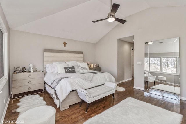 bedroom featuring lofted ceiling, dark hardwood / wood-style floors, and ceiling fan