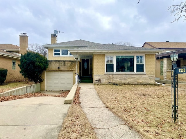 view of front of home with a garage