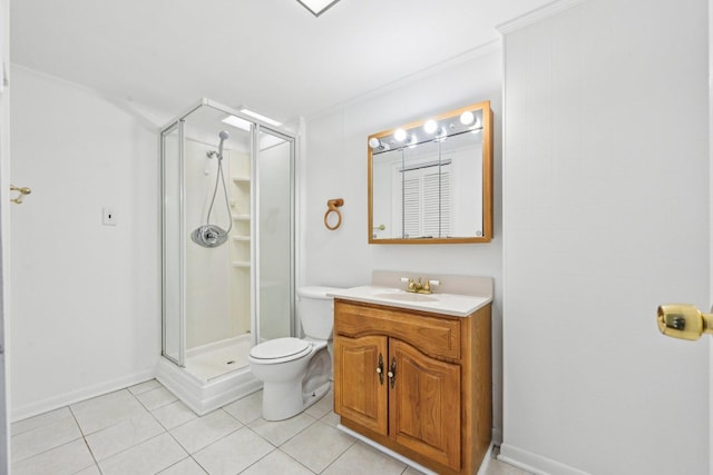 bathroom featuring tile patterned flooring, vanity, a shower with shower door, and toilet