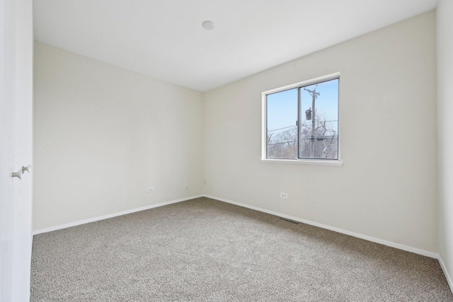 view of carpeted spare room