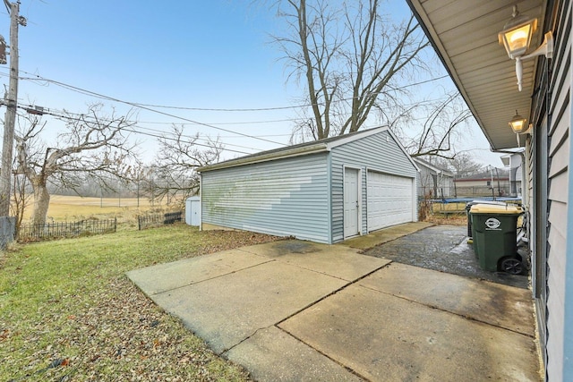 garage with a lawn