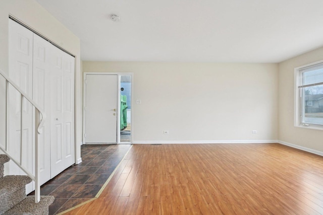 entryway with dark wood-type flooring