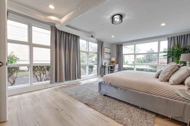 bedroom with light wood-type flooring