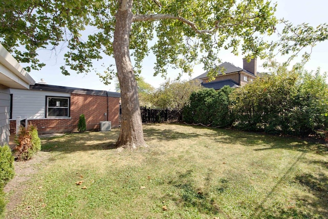 view of yard with central air condition unit