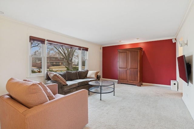 living room with ornamental molding and light carpet