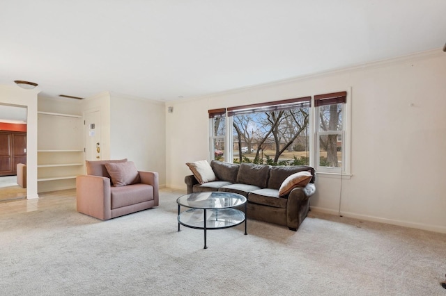 carpeted living room with crown molding