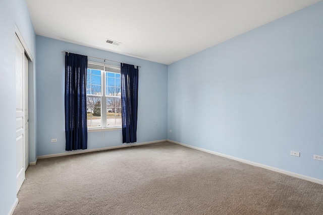 view of carpeted spare room