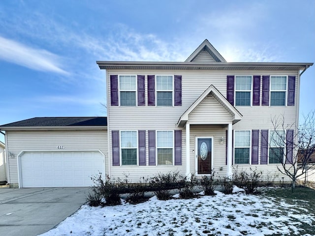 view of front of home with a garage