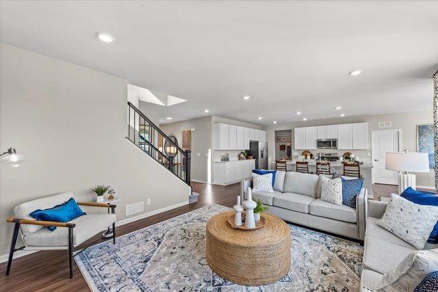 living room with dark wood-type flooring