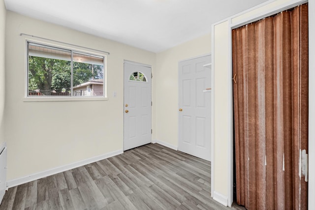 entryway with light hardwood / wood-style floors