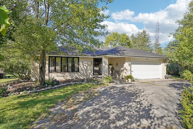 single story home with a garage