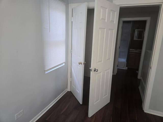 hall with sink and dark hardwood / wood-style floors