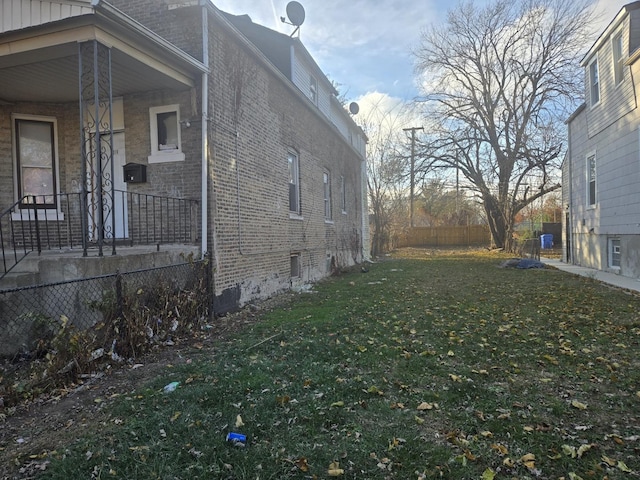 view of home's exterior featuring a yard