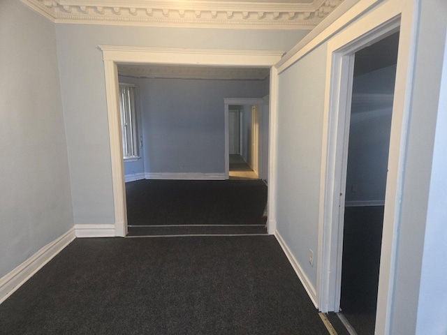 corridor with dark colored carpet