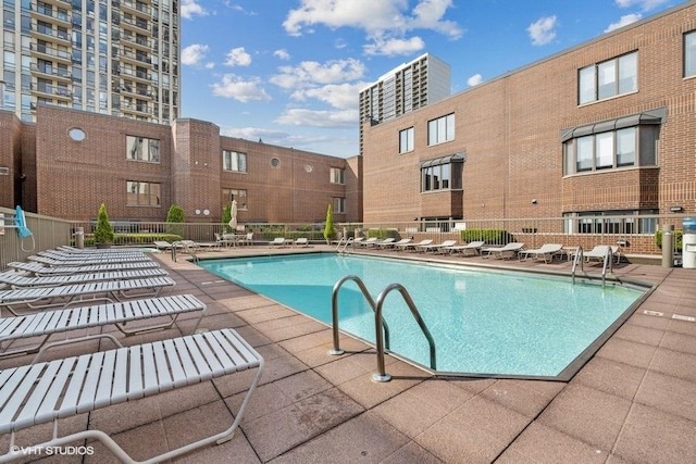 view of pool featuring a patio area